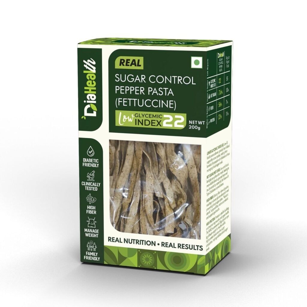 Diahealth Sugar Control Pepper Pasta (Fettuccine) packaging box with clear window showing pasta inside, highlighting low glycemic index 22, diabetic friendly, clinically tested, high fiber, weight management, and family friendly benefits.